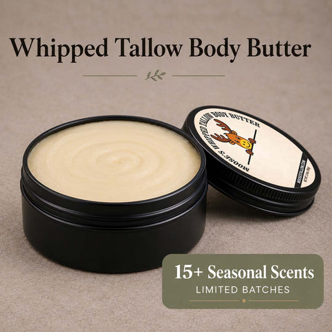Open matte black tin of whipped tallow body butter, available in 15+ seasonal scents