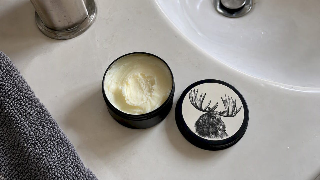 Tallow moisturizer in a black matte tin