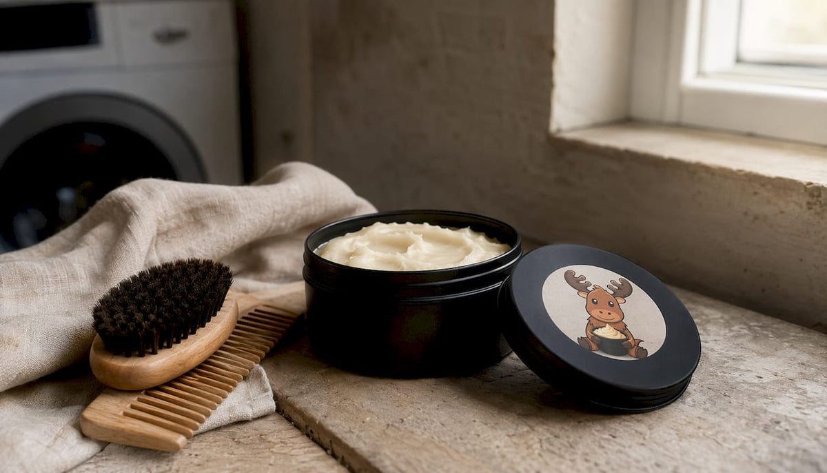Matte black tallow container with skincare props on vanity