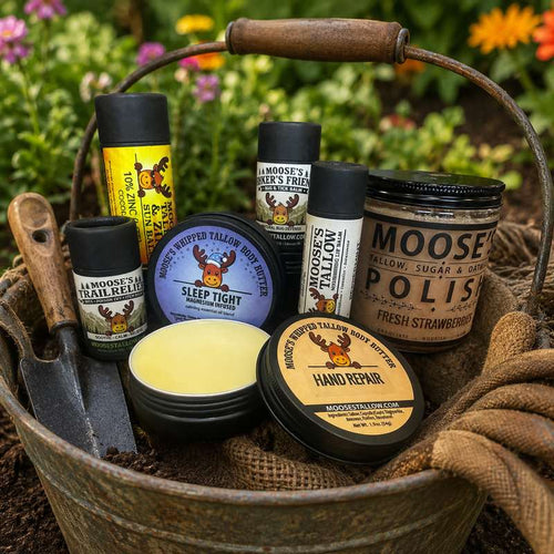 Moose's Tallow gifts for gardeners: Sun Balm, Hiker's Friend, Trail Relief, Sleep Tight, Hand Repair, and Fresh Strawberry Sugar Polish in a garden basket