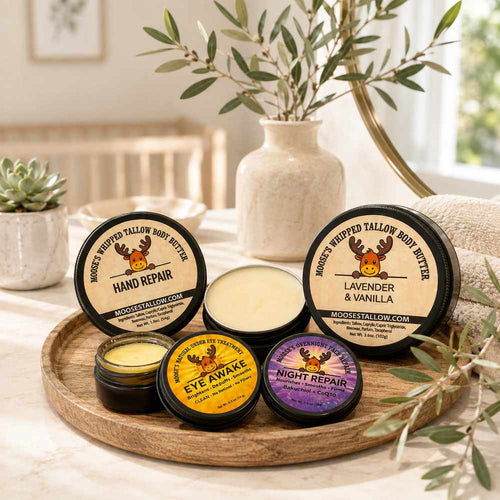 Moose's Tallow mature skincare tray with Hand Repair, Lavender & Vanilla body butter, Eye Awake, and Night Repair among olive branches