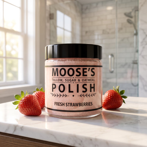 Strawberry sugar scrub jar with fresh strawberries for soft, smooth skin