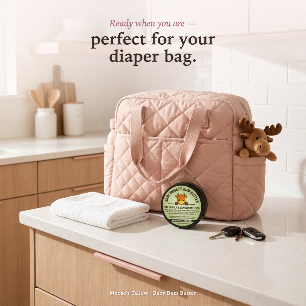 Natural diaper cream perfect for your diaper bag — Baby Bum Butter closed tin beside a pink diaper bag on the kitchen counter, ready to head out the door