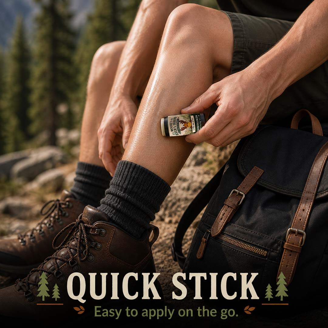 Hiker applying Hiker's Friend DEET-free bug balm to a leg on the trail, easy on the go