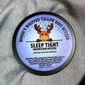 Moose's Sleep Tight Magnesium Whipped Tallow Body Butter tin on a cozy blanket